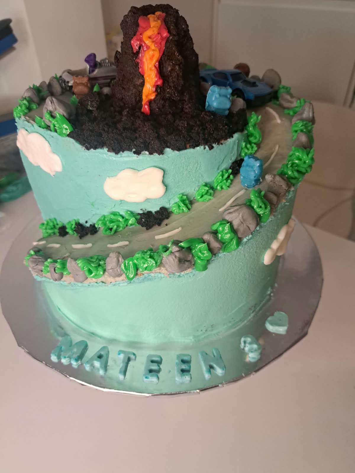 Dinosaur volcano cake