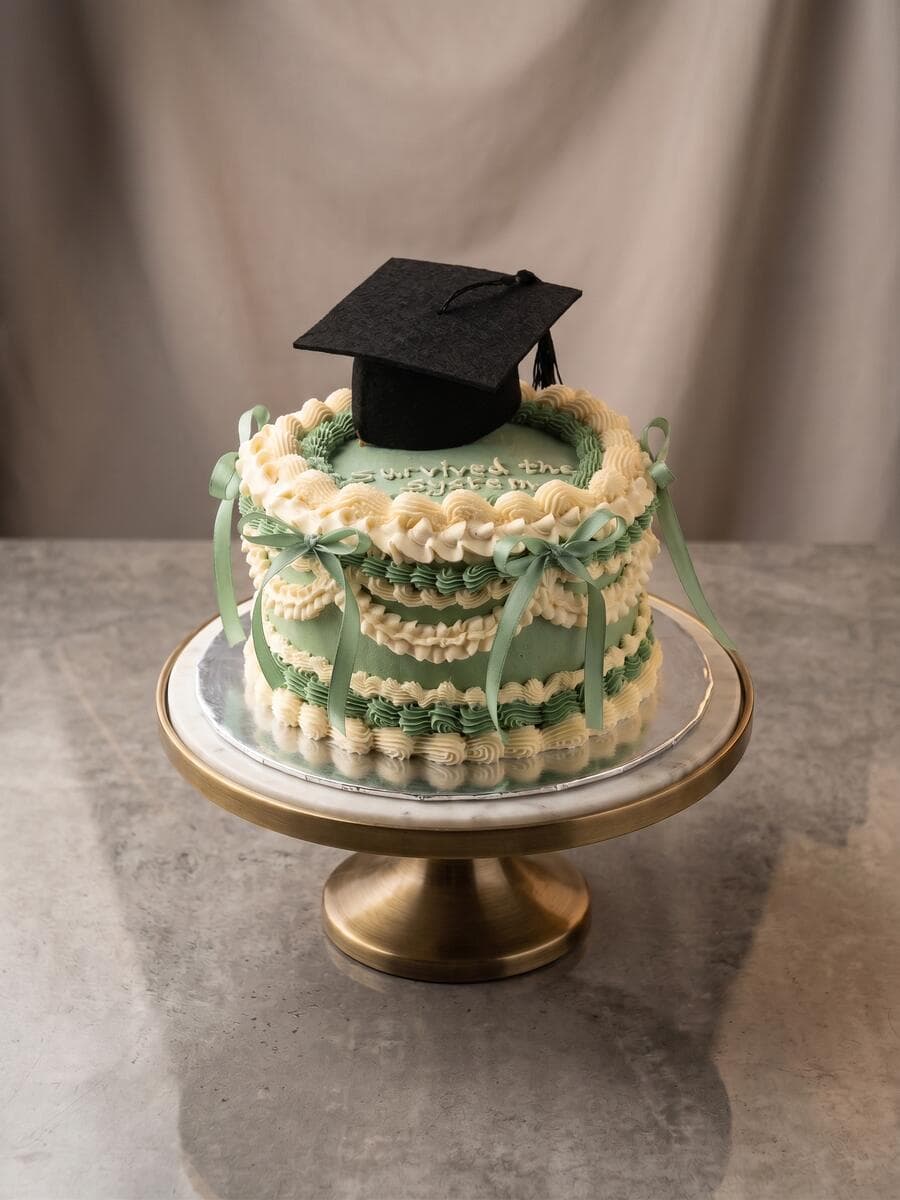 Green graduation cake