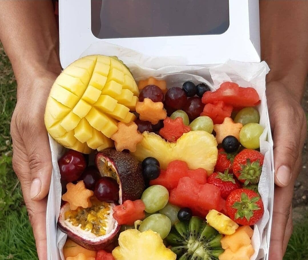 Fruit platter with mango and berries
